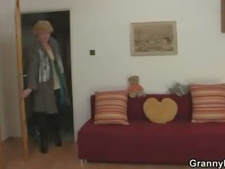Blonde granny jumps on his cock