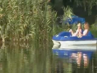 Eva and Loly naked by the river